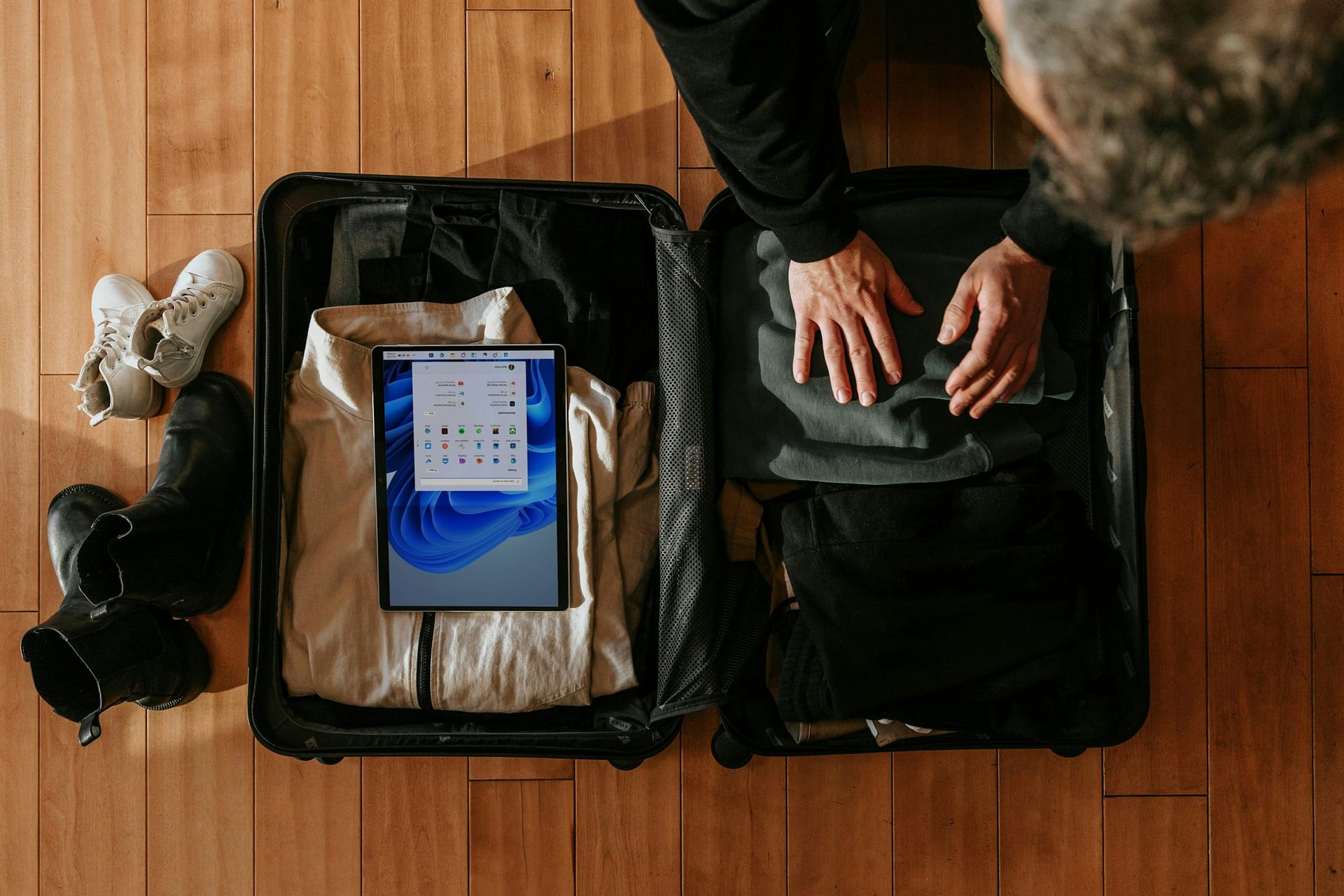 China travel gear packing list laid out on surface